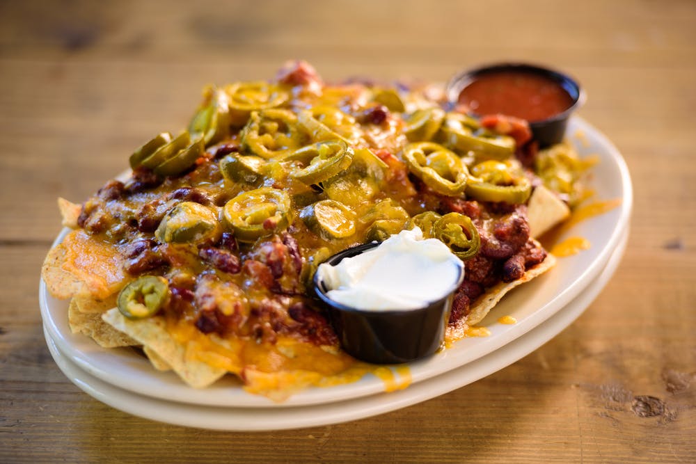 Order Nacho Supreme - Appetizer food online from Bellacino Pizza & Grinders store, South Point on bringmethat.com