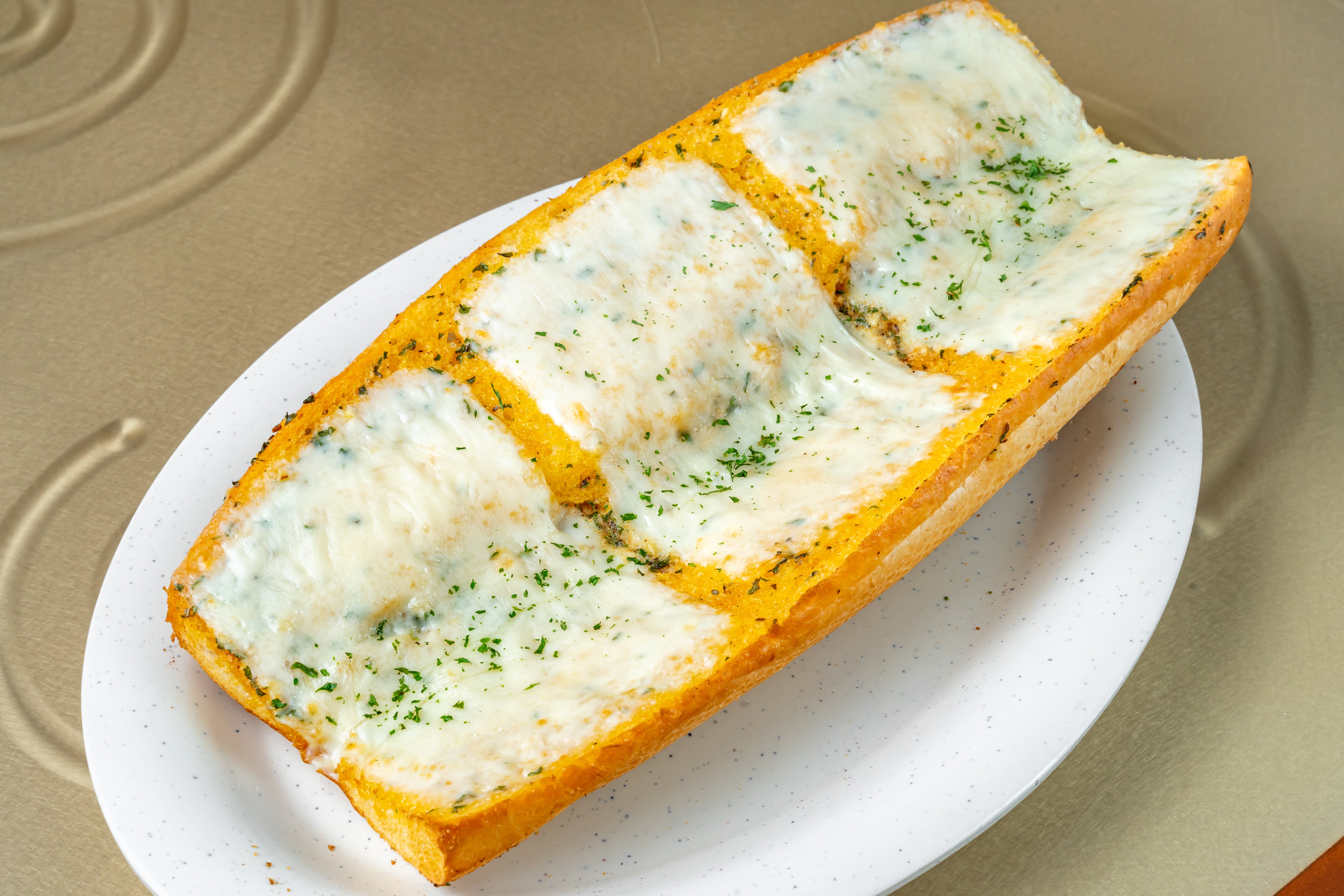 Order Garlic Cheese Bread - Appetizer food online from My Pizzeria store, Fort Worth on bringmethat.com
