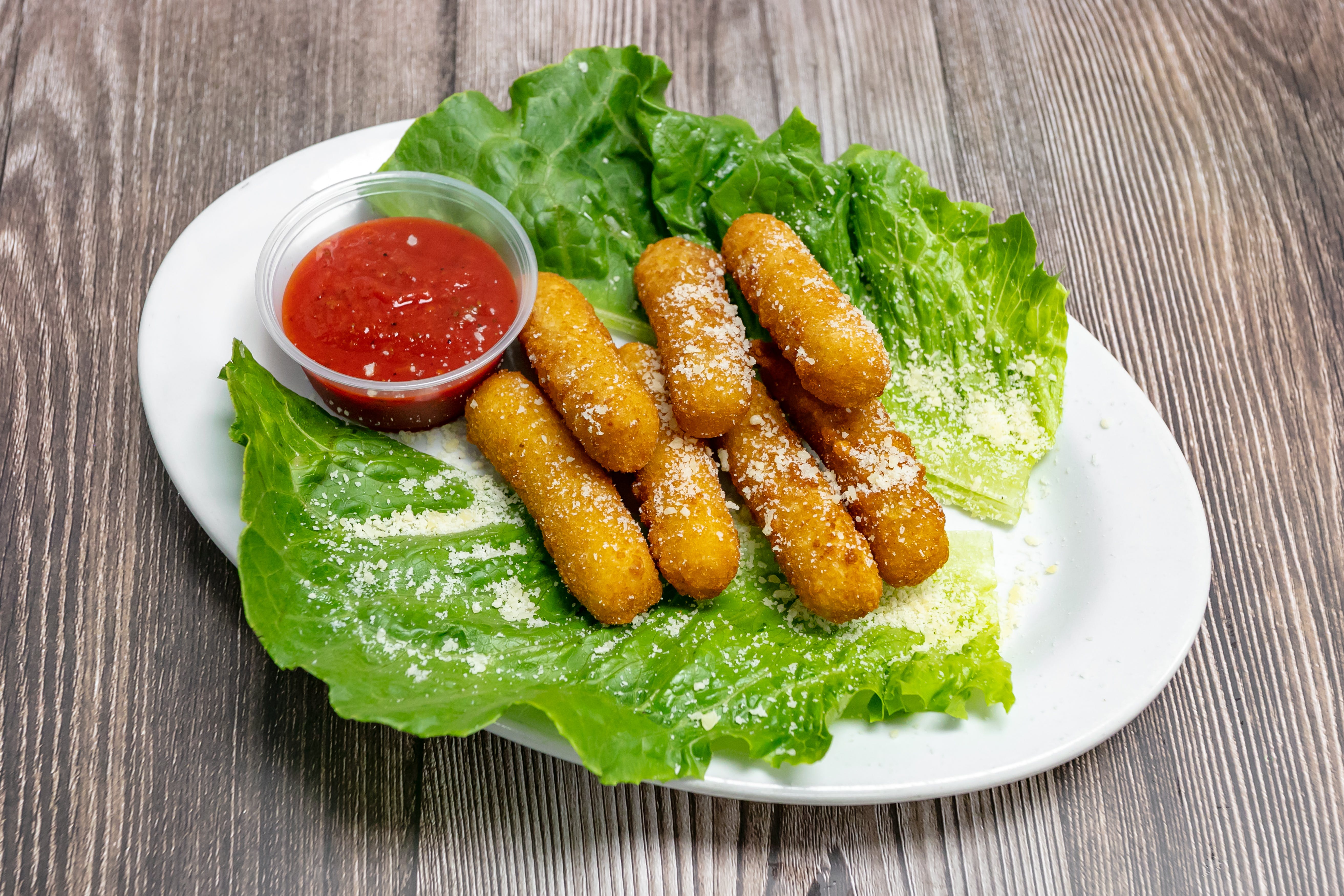 Order Mozzarella Sticks - 7 Pieces food online from Star Pizza store, Roswell on bringmethat.com