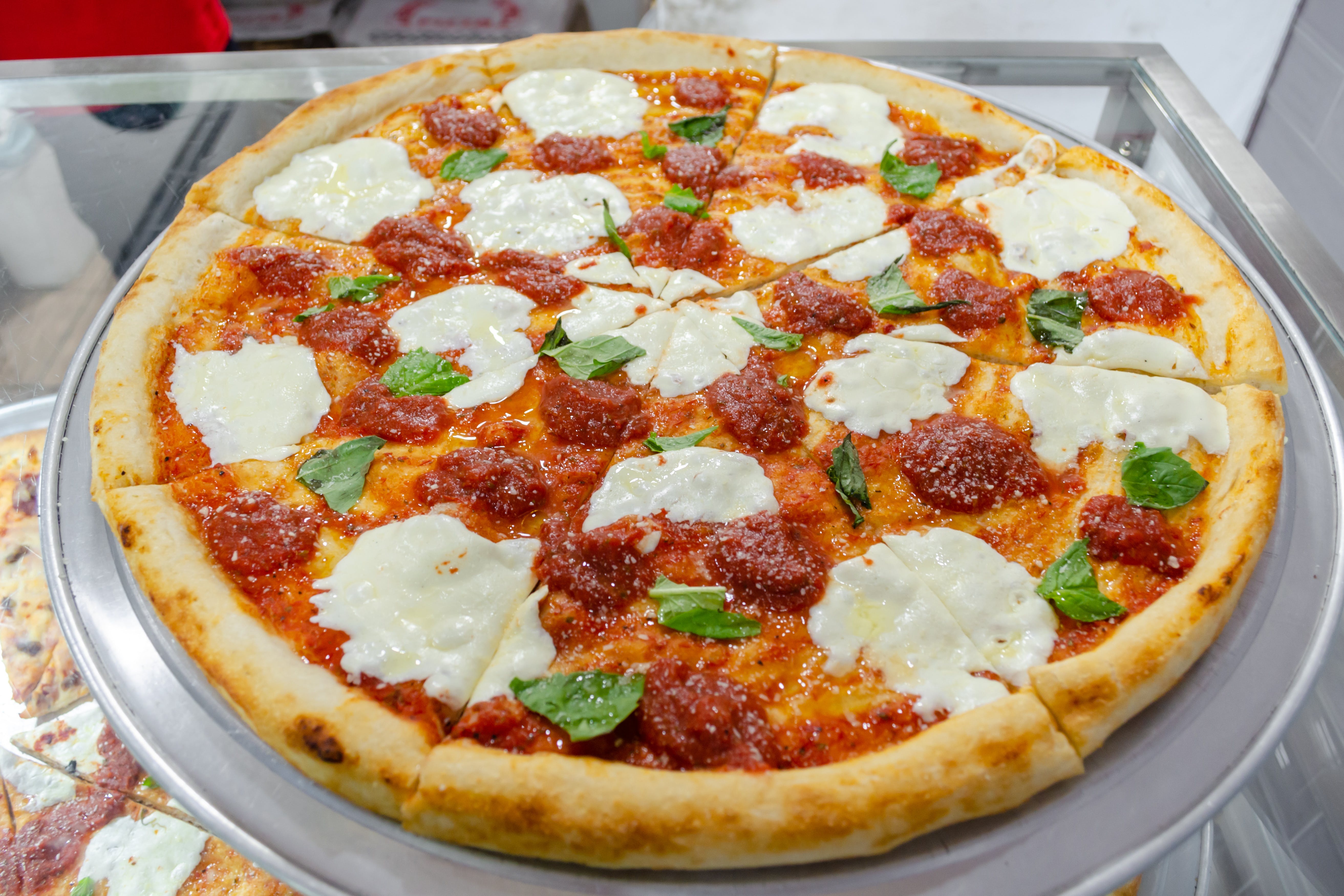 Order Margherita Pizza - 18'' food online from 99¢ Pizza & Hot Dog store, New York on bringmethat.com