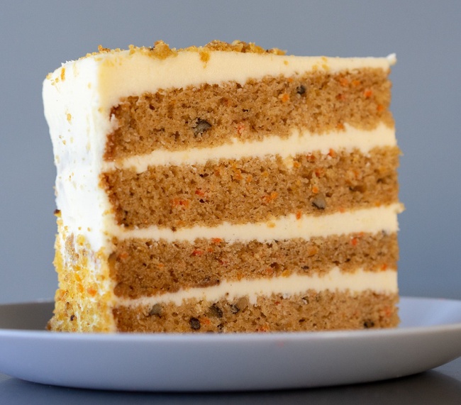 Order Carrot Cake Slice food online from Carlo's Bakery store, Bloomington on bringmethat.com