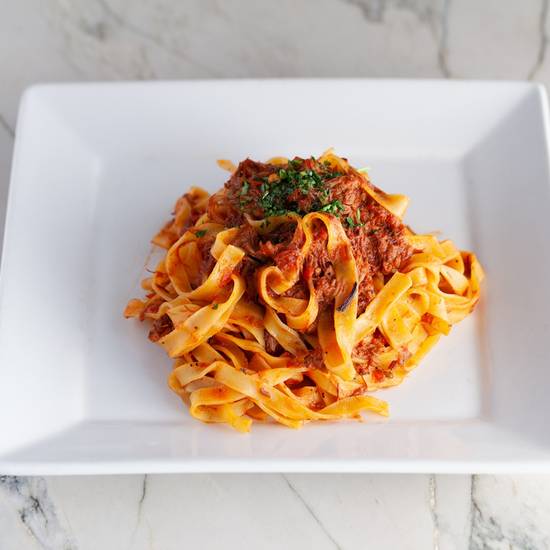 Order Tagliatelle Al Ragu’ Di Agnello food online from Bencotto Italian Kitchen store, San Diego on bringmethat.com
