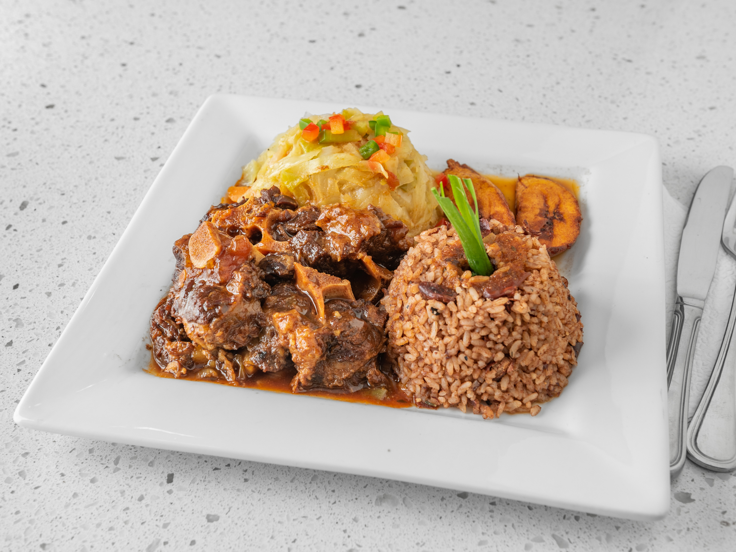 Order Jamaican Style Oxtail food online from Aunty Joy's Jamaican Kitchen store, Chicago on bringmethat.com