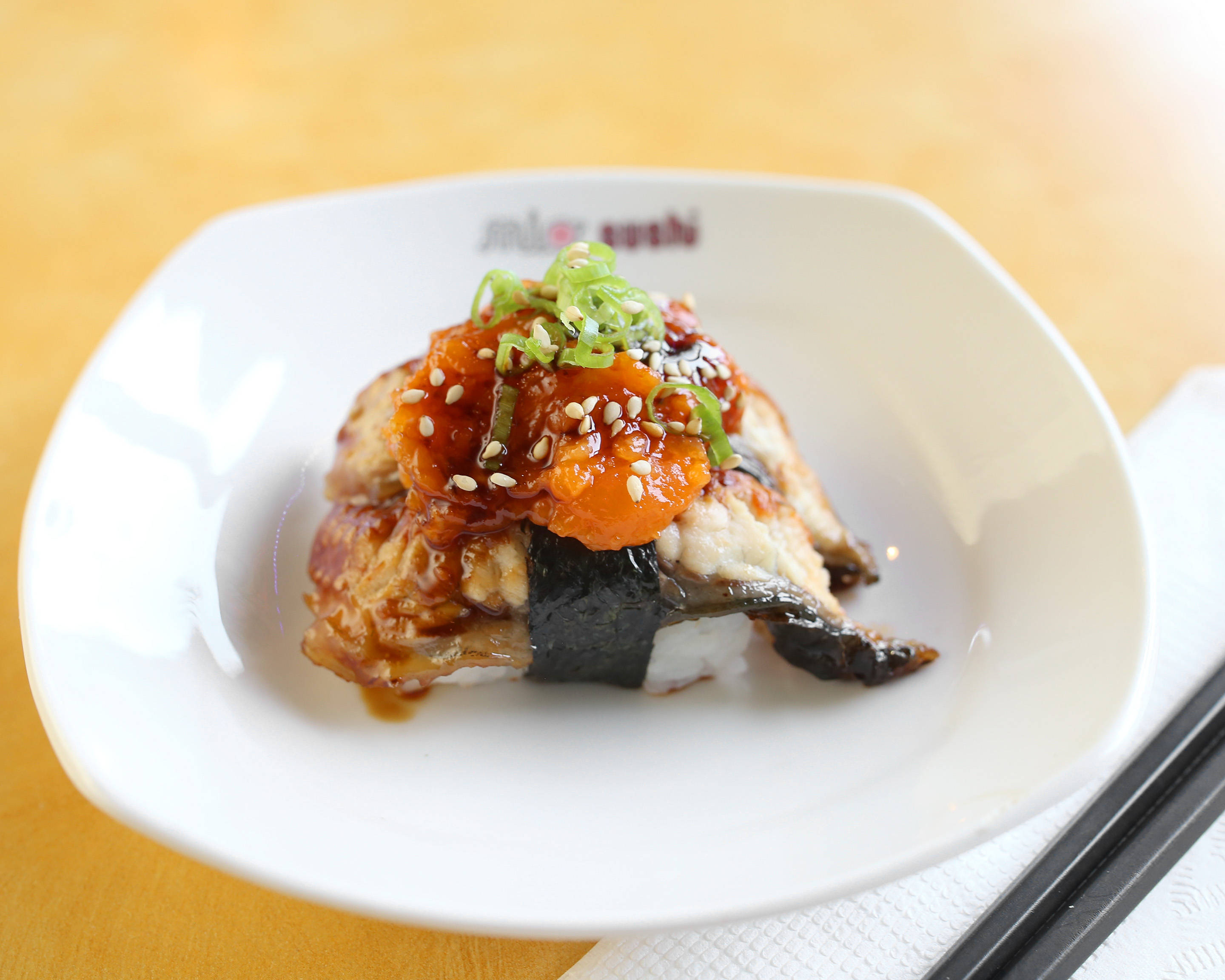 Order Spicy Salmon on Top of Unagi Nigiri food online from Mio Sushi store, Beaverton on bringmethat.com