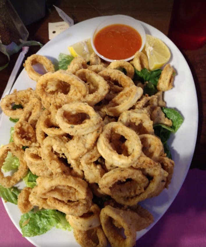 Order Fried Calamari - Appetizer food online from Planet Pizza store, Monroe on bringmethat.com