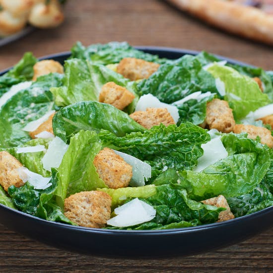 Order Caesar Salad - Small food online from Flippin' Pizza store, Long Beach on bringmethat.com