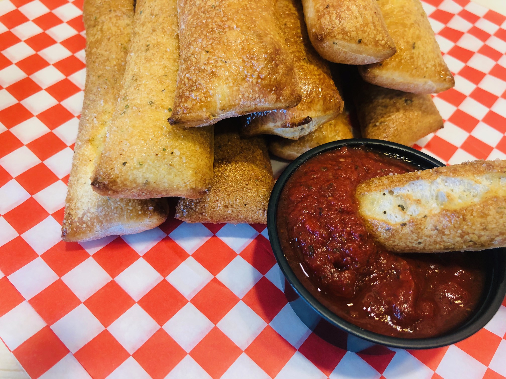 Order Breadsticks food online from T-Mamas store, Aurora on bringmethat.com