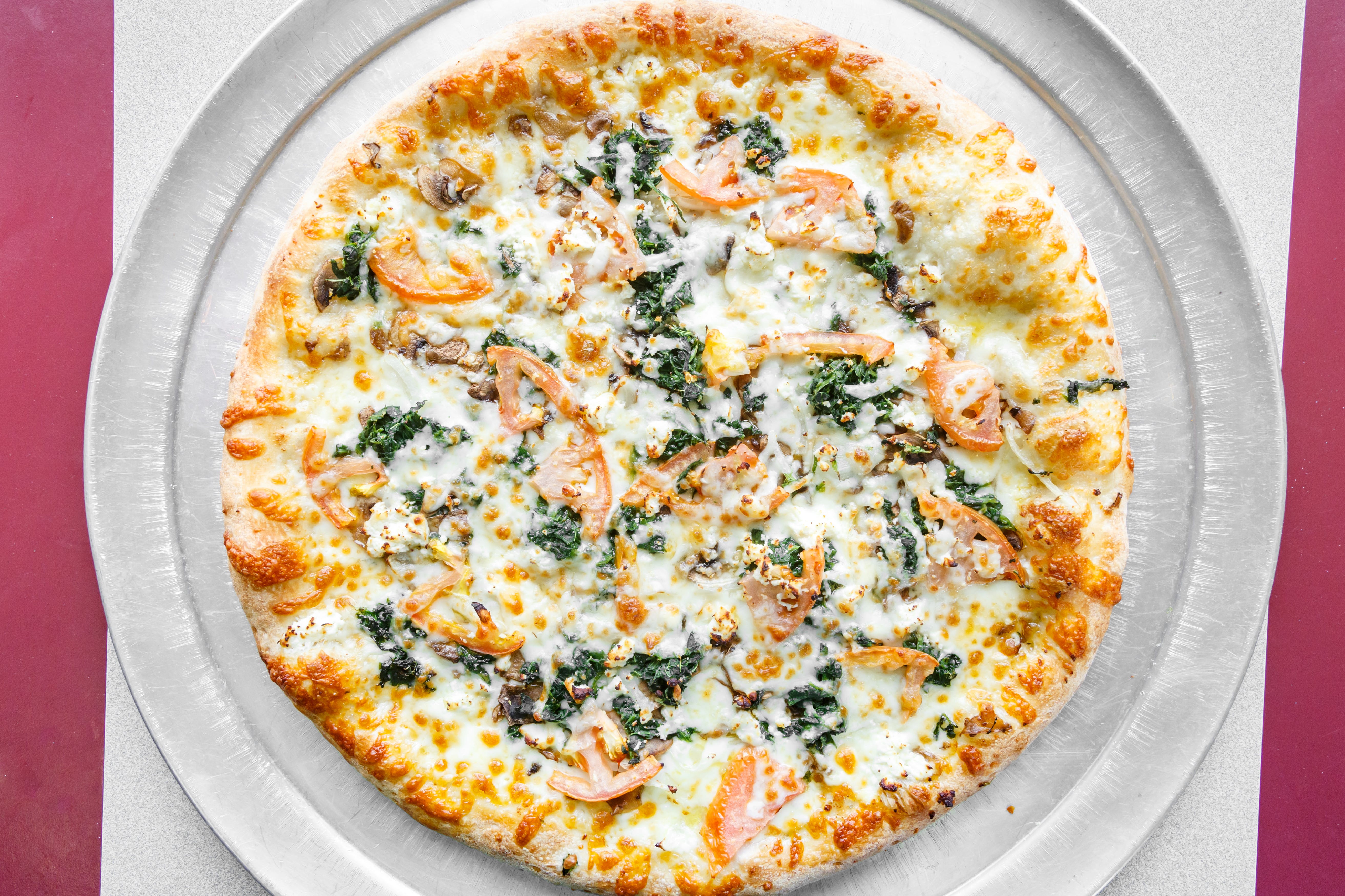 Order Spinach Pizza - Small 10'' (6 Cuts) food online from Raya's Pizzeria store, Carnegie on bringmethat.com