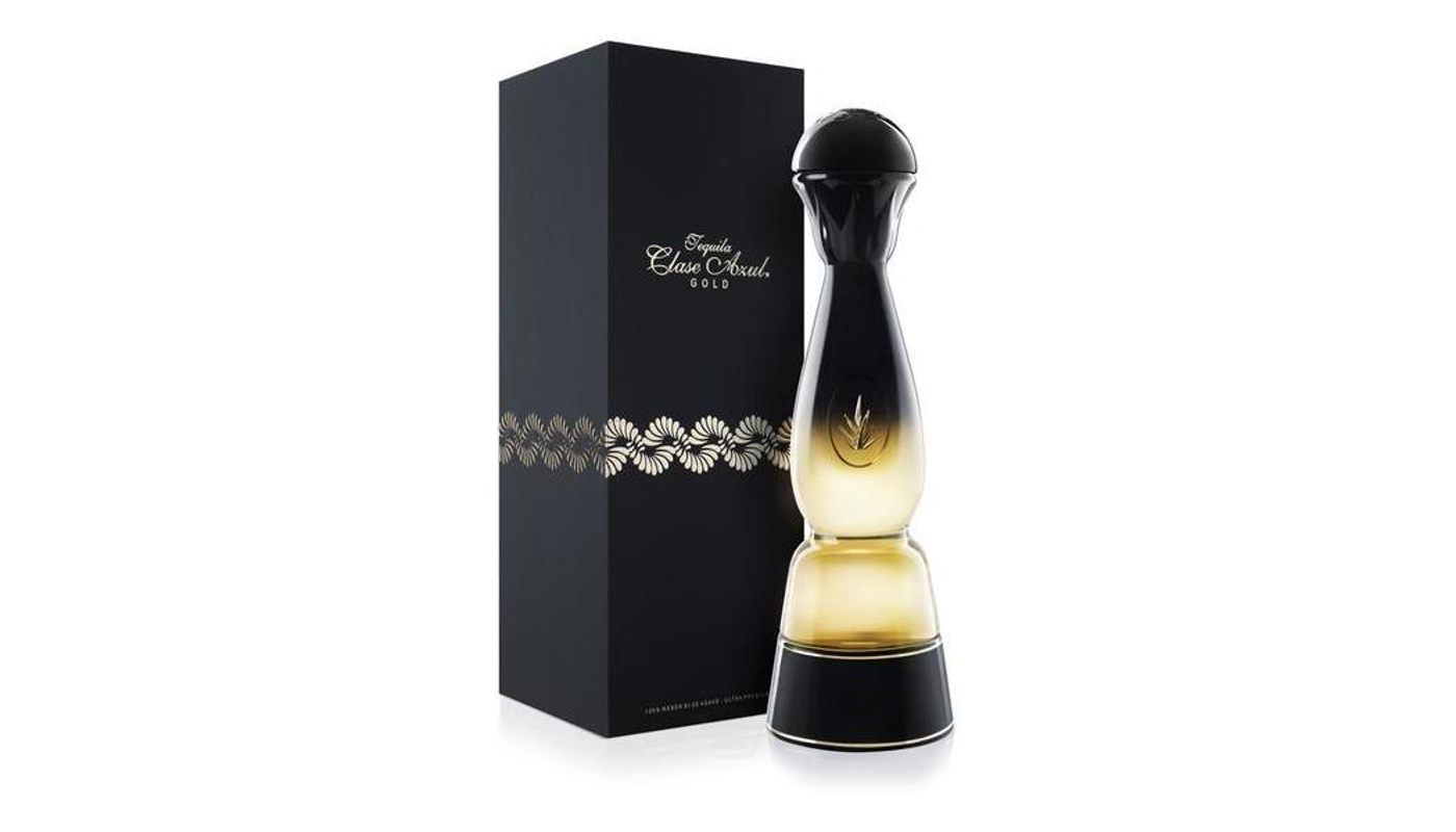 Order Clase Azul Gold Tequila 750ml Bottle food online from Circus Liquor store, Los Angeles on bringmethat.com