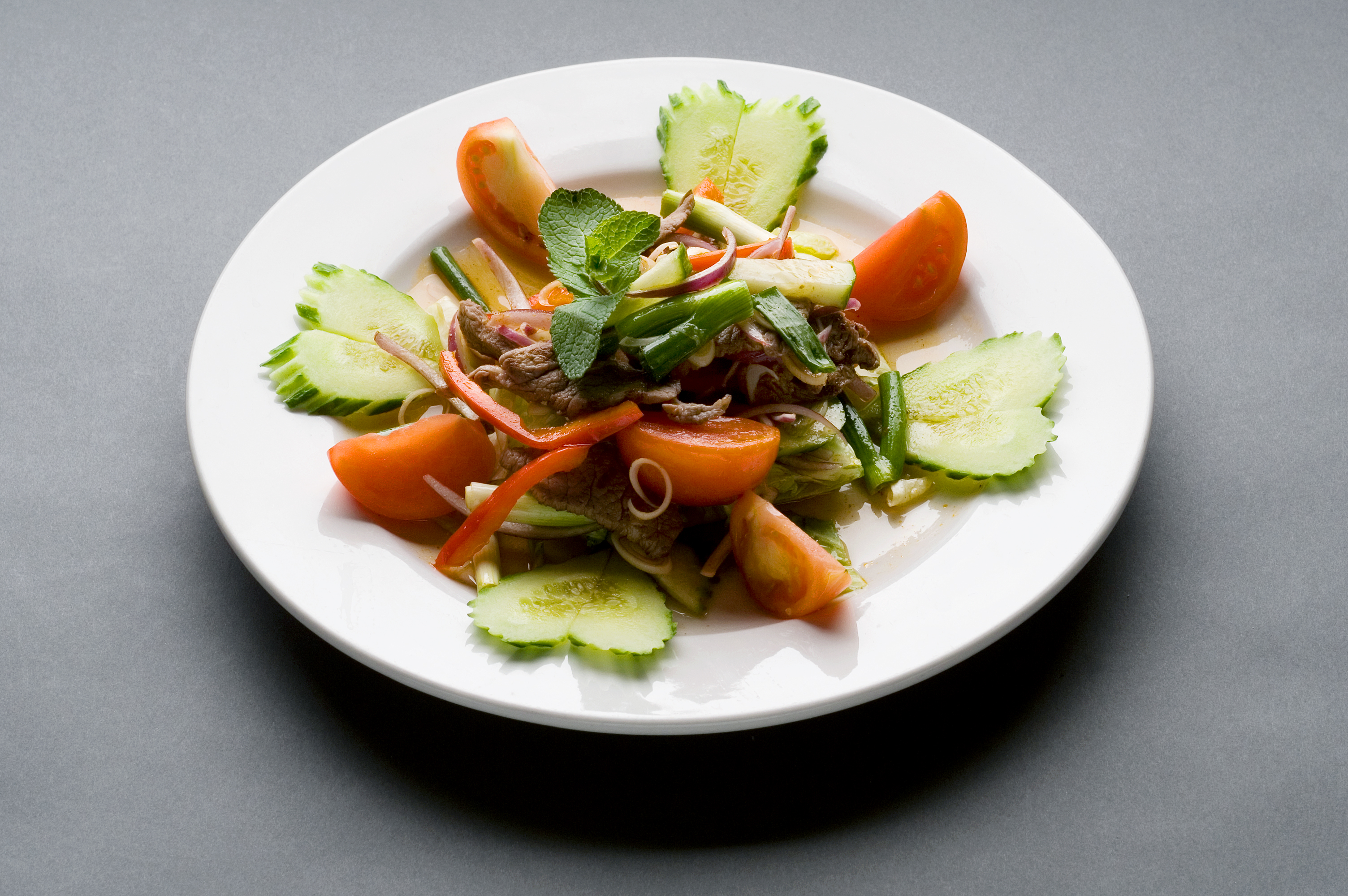 Order 28. Yum Nuer Salad food online from Thai Taste store, South Portland on bringmethat.com