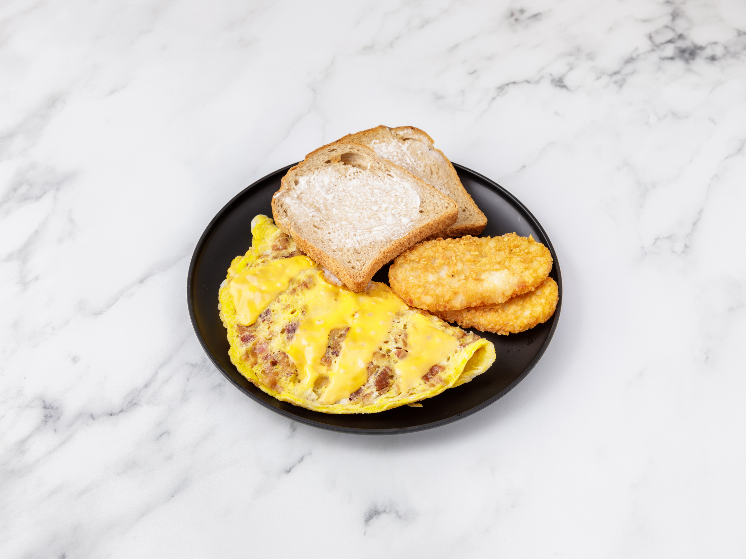 Order Meat Lover's Omelette food online from Bon Appetite Bagels store, Totowa on bringmethat.com