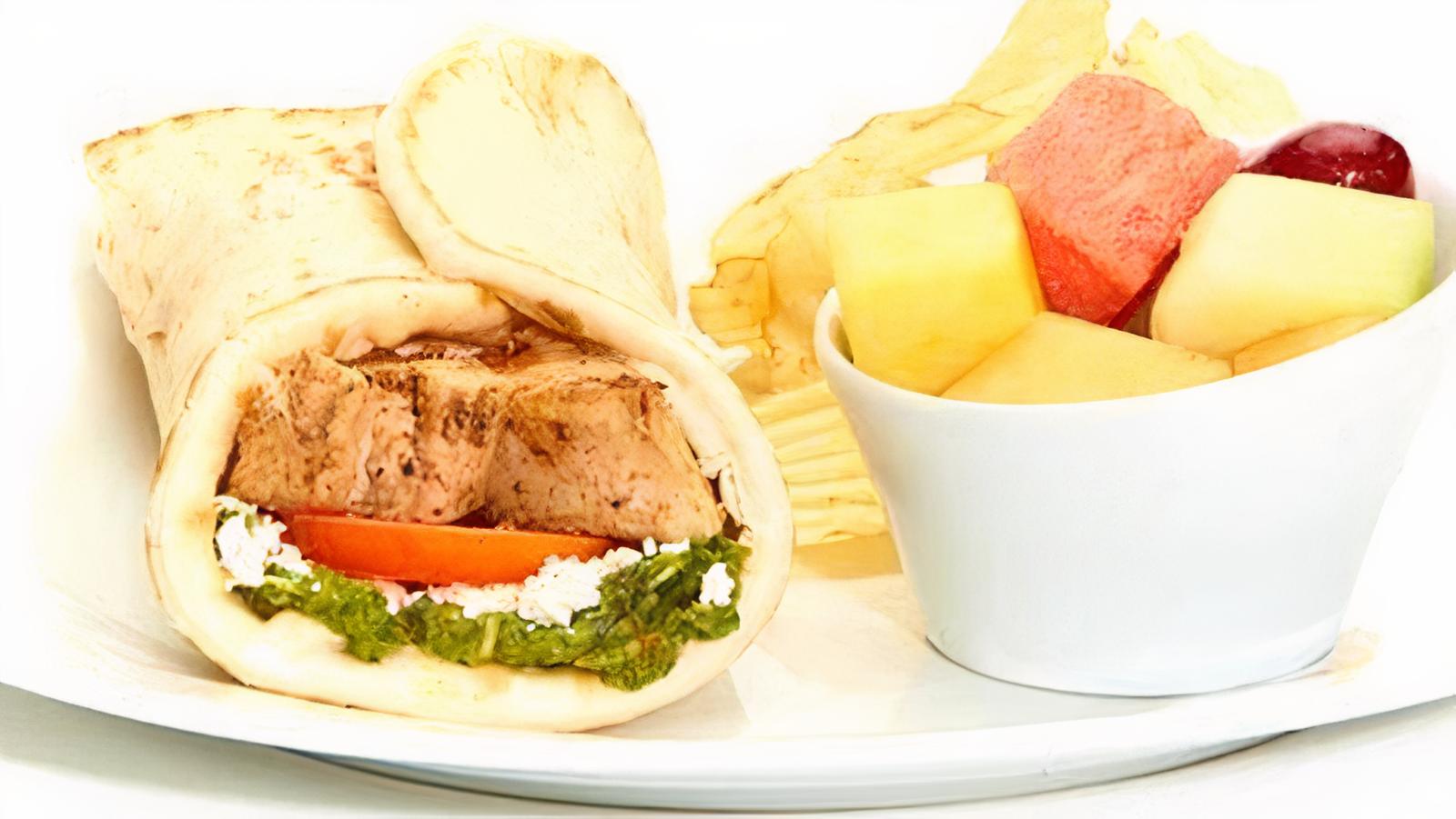 Order Grilled Chicken Basil-Pesto Aioli Gyro food online from Taziki's Mediterranean Cafe store, Brentwood on bringmethat.com