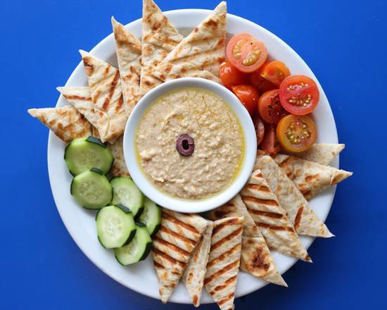 Order Dressed Hummus food online from Reginelli's Pizzeria store, New Orleans on bringmethat.com