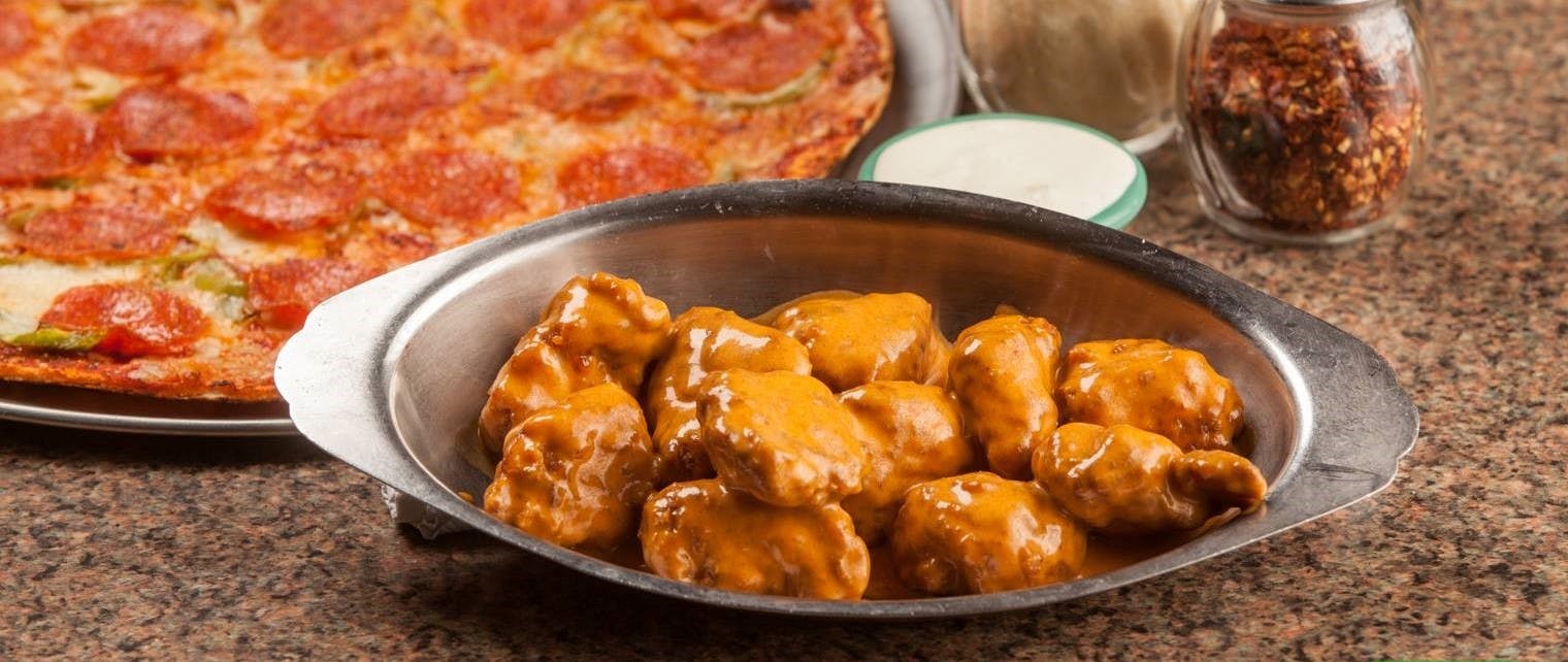 Order Boneless Chicken Wings - 1 Lb. food online from Cecil Whittaker's Pizzeria store, Festus on bringmethat.com