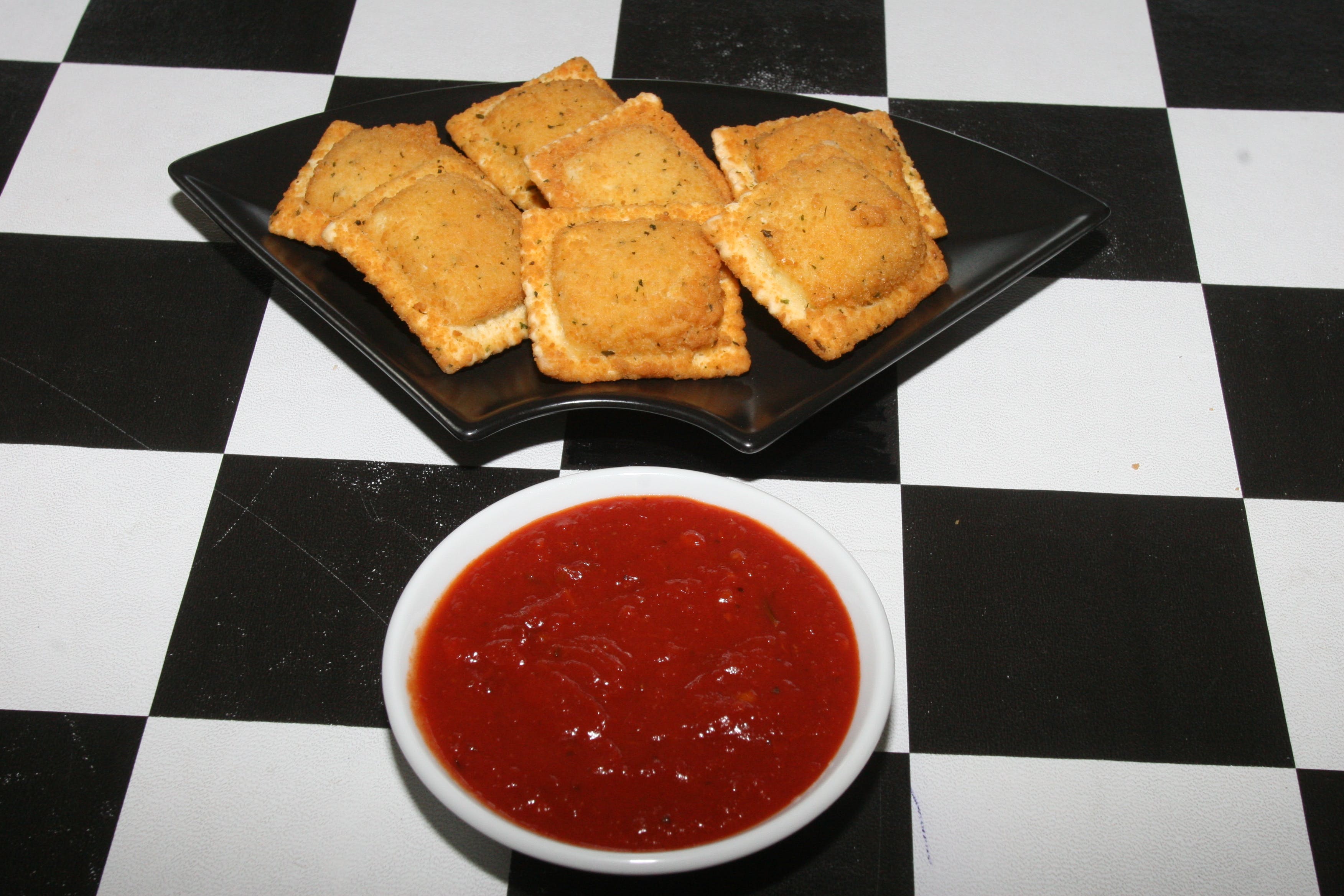 Order Breaded Ravioli - Appetizer food online from Fratelli Ny Pizza store, Canoga Park on bringmethat.com