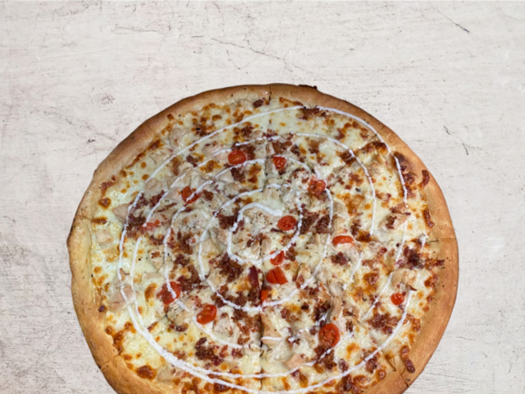 Order Chicken Bacon Ranch Pizza* food online from The Slice Pizzeria store, San Antonio on bringmethat.com