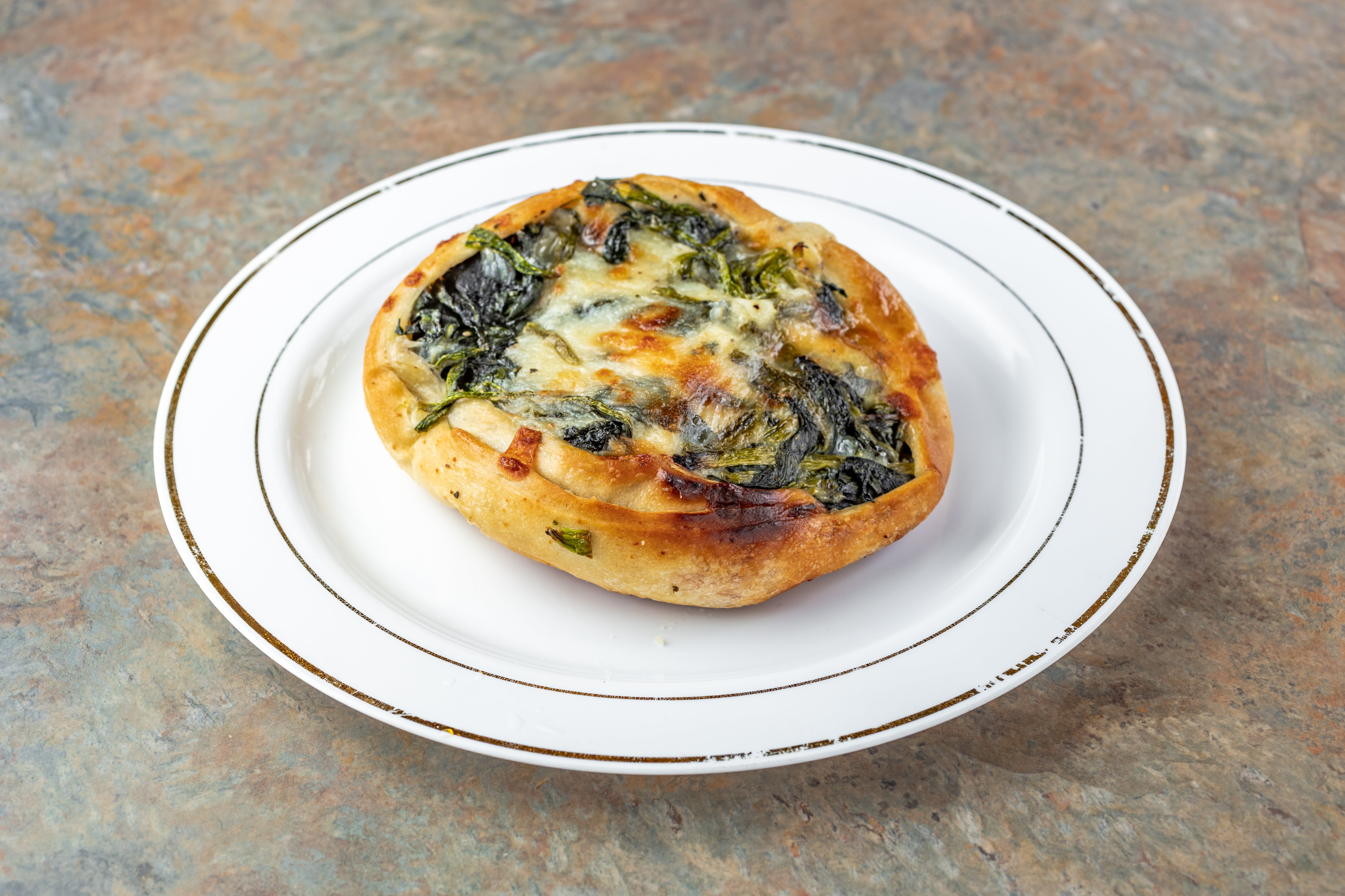 Order Spinach Wheels - Appetizer food online from Gigi's pizza store, Whitestone on bringmethat.com