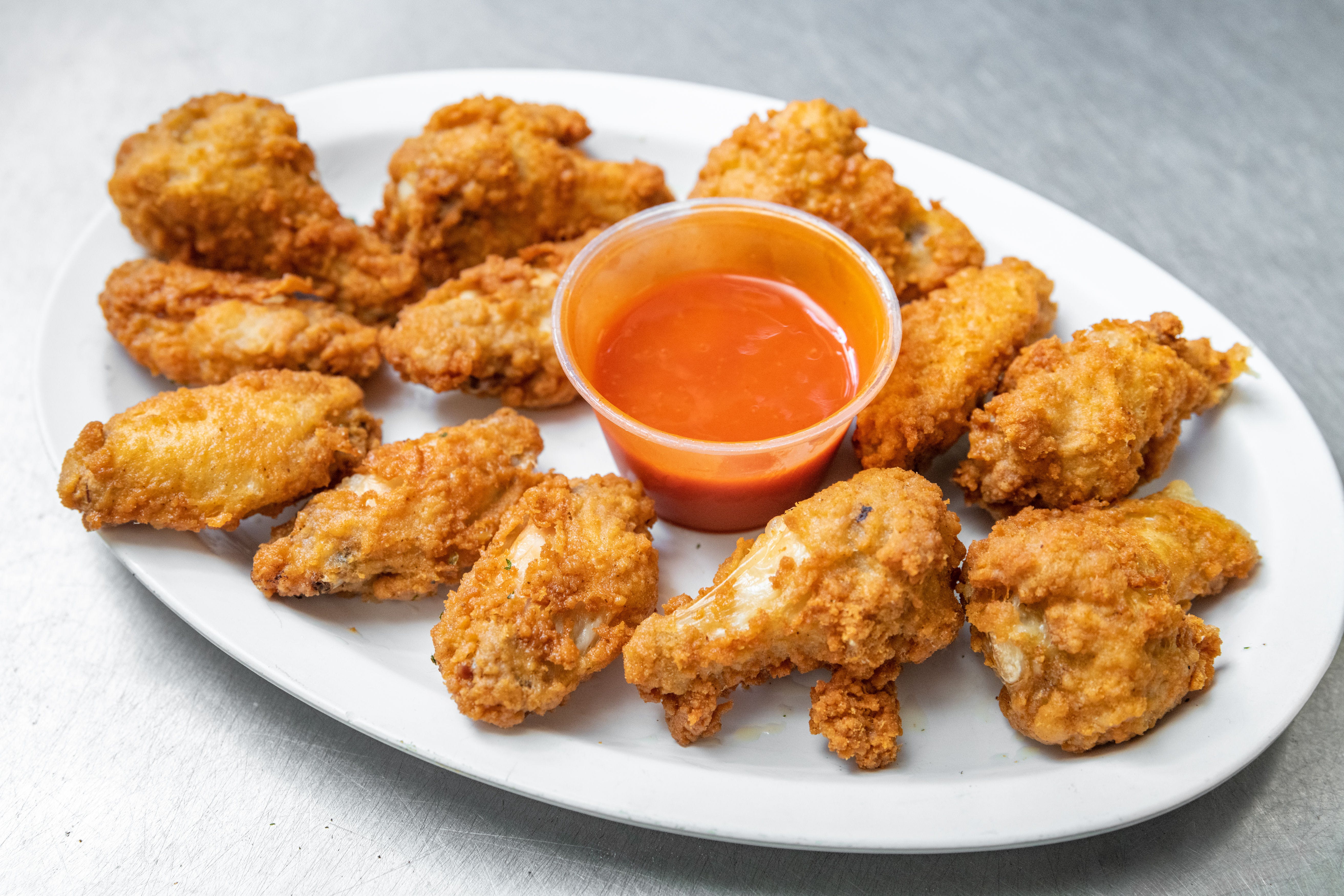 Order Buffalo Wings - 12 Pieces food online from Jerry and Joe's Pizza store, Palmetto Bay on bringmethat.com