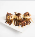 Order 1 Dozen Turtle Cheesecake Minis  food online from Masterpiece Desserts store, Houston on bringmethat.com