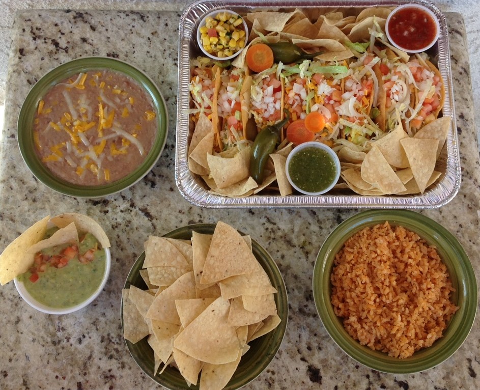Order 8 Taco Family Pack 24 oz Rice & Beans, 8 oz Guac & sauce & Chips  food online from Burrito Factory store, Sunland on bringmethat.com