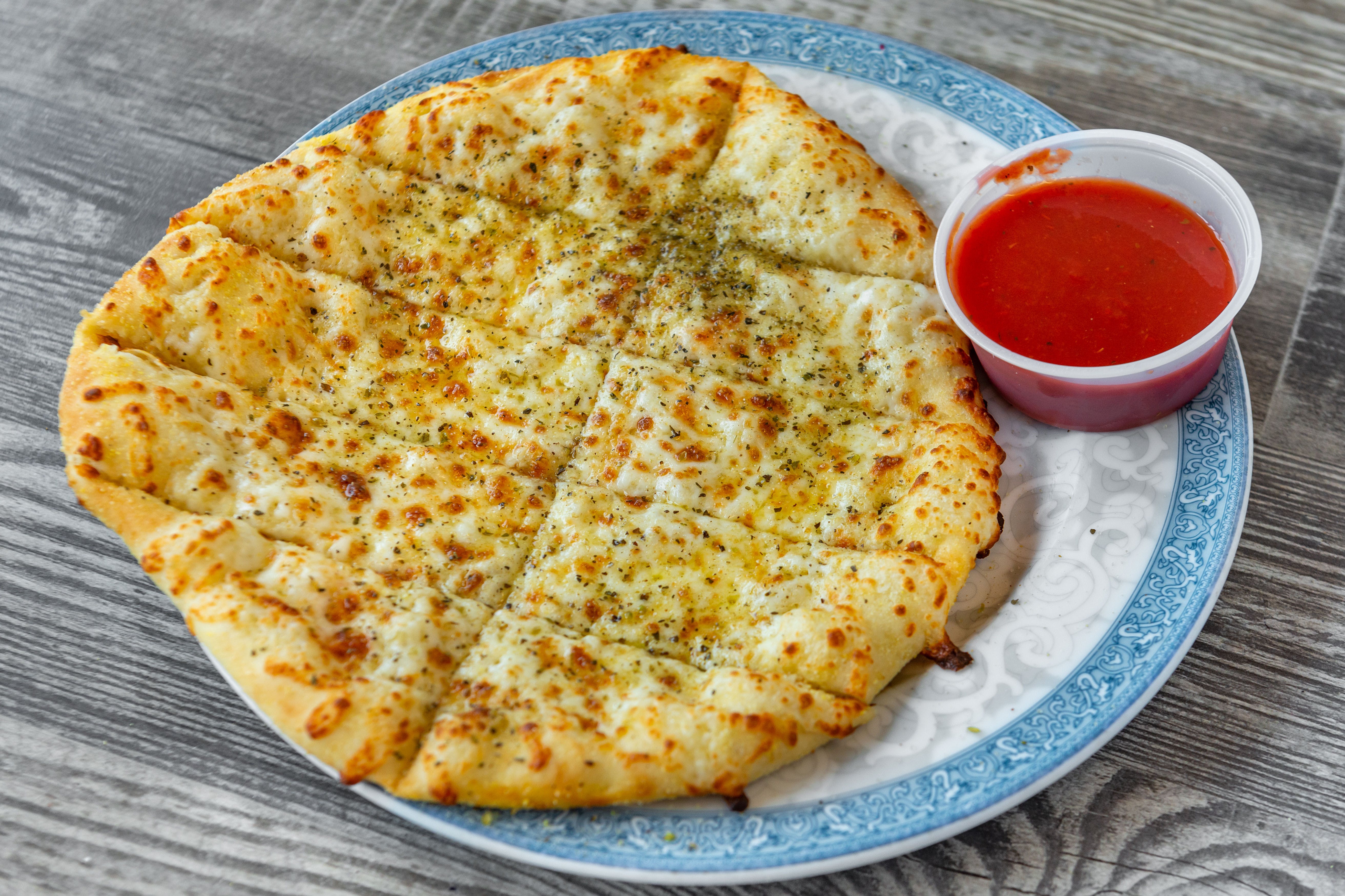 Order Cheesesticks - Side food online from Grand slam pizza store, Woodstock on bringmethat.com