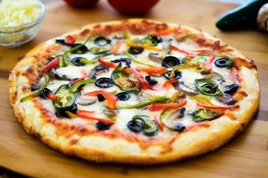 Order Veggie Special Pizza - 10" food online from Bellerose Famous Pizza store, Flushing on bringmethat.com