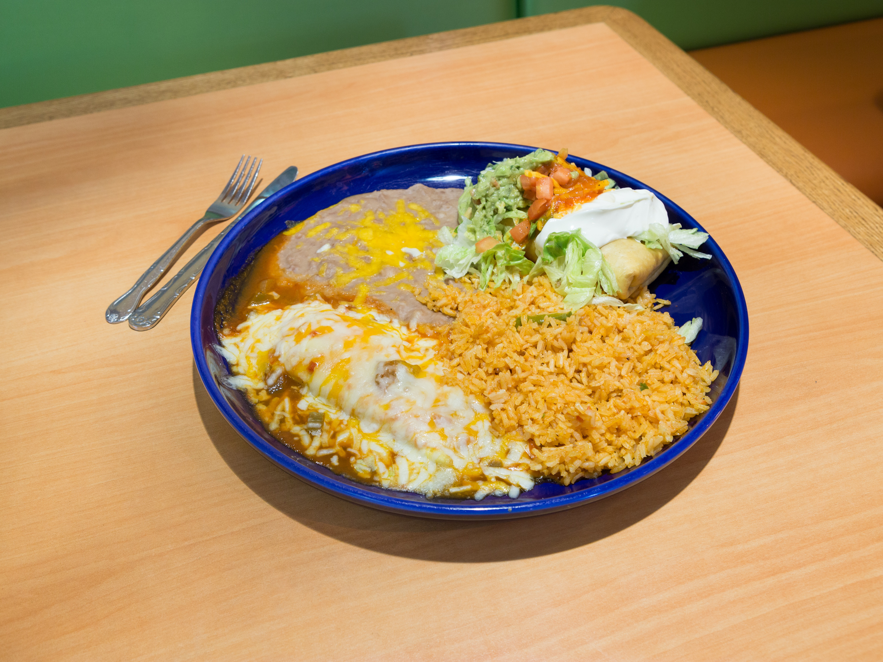 Order 21. Chimichanga with Chile Relleno Combo food online from Mi Jalisco Family Mexican store, Aloha on bringmethat.com
