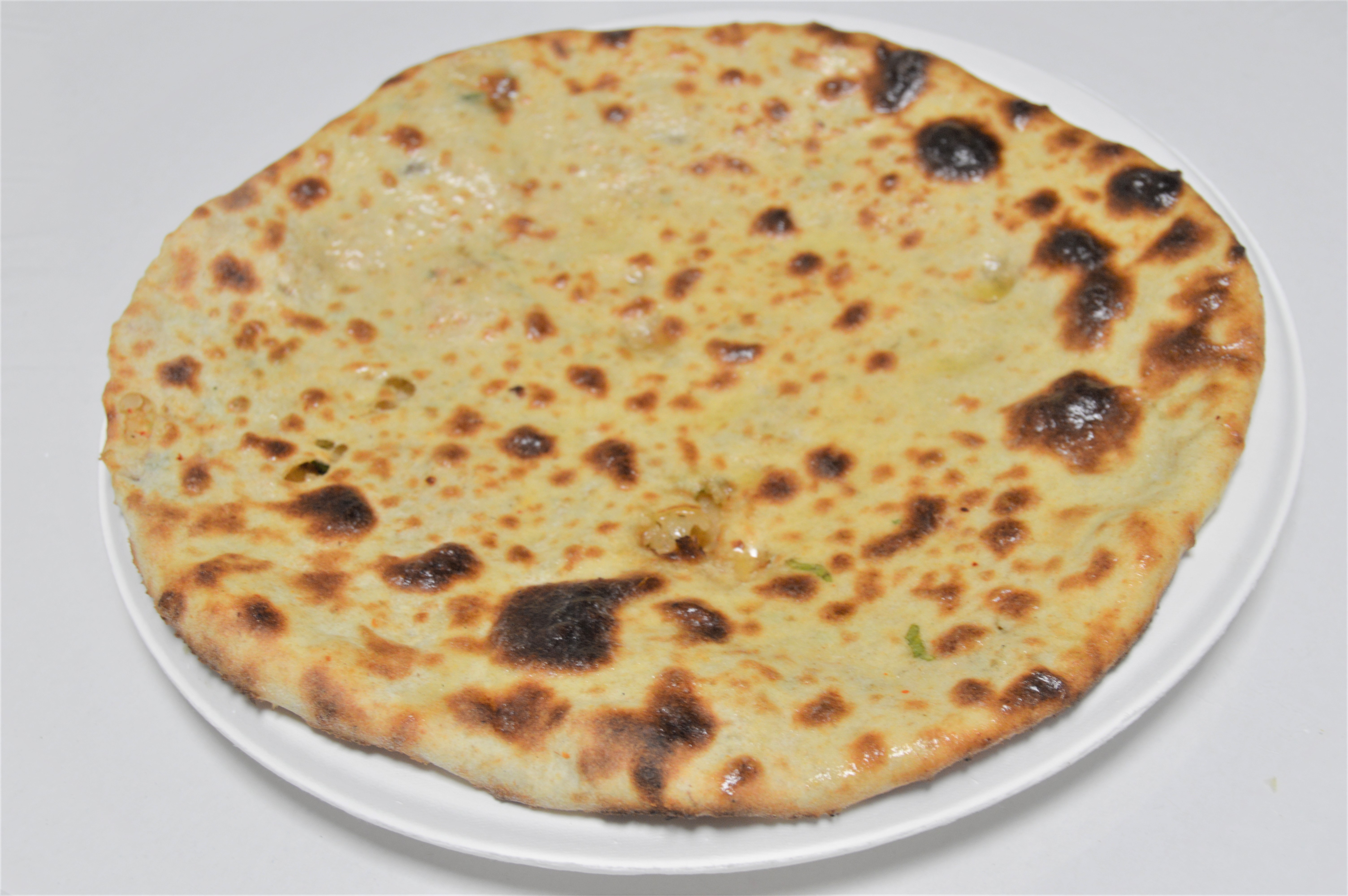 Order 20. Aloo Paratha food online from Salt And Pepper Grill Iii store, Washington on bringmethat.com