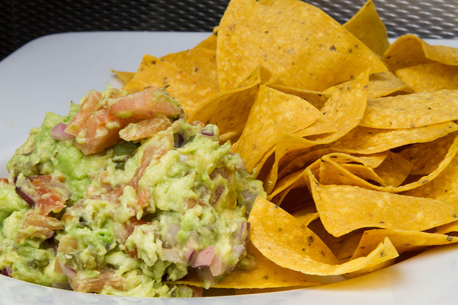Order Guacamole and Chips food online from Moonstruck Eatery store, New York on bringmethat.com