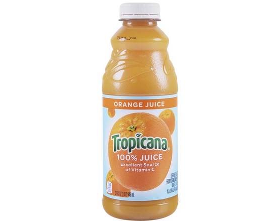 Order Tropicana Orange Juice, 32oz Bottle food online from Chris's Liquor- 2203 S Lamar Blvd store, Austin on bringmethat.com