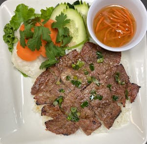 Order 33. Steamed Rice with Grilled Pork (Cơm Thịt Nướng) food online from Pho An 2 store, Houston on bringmethat.com