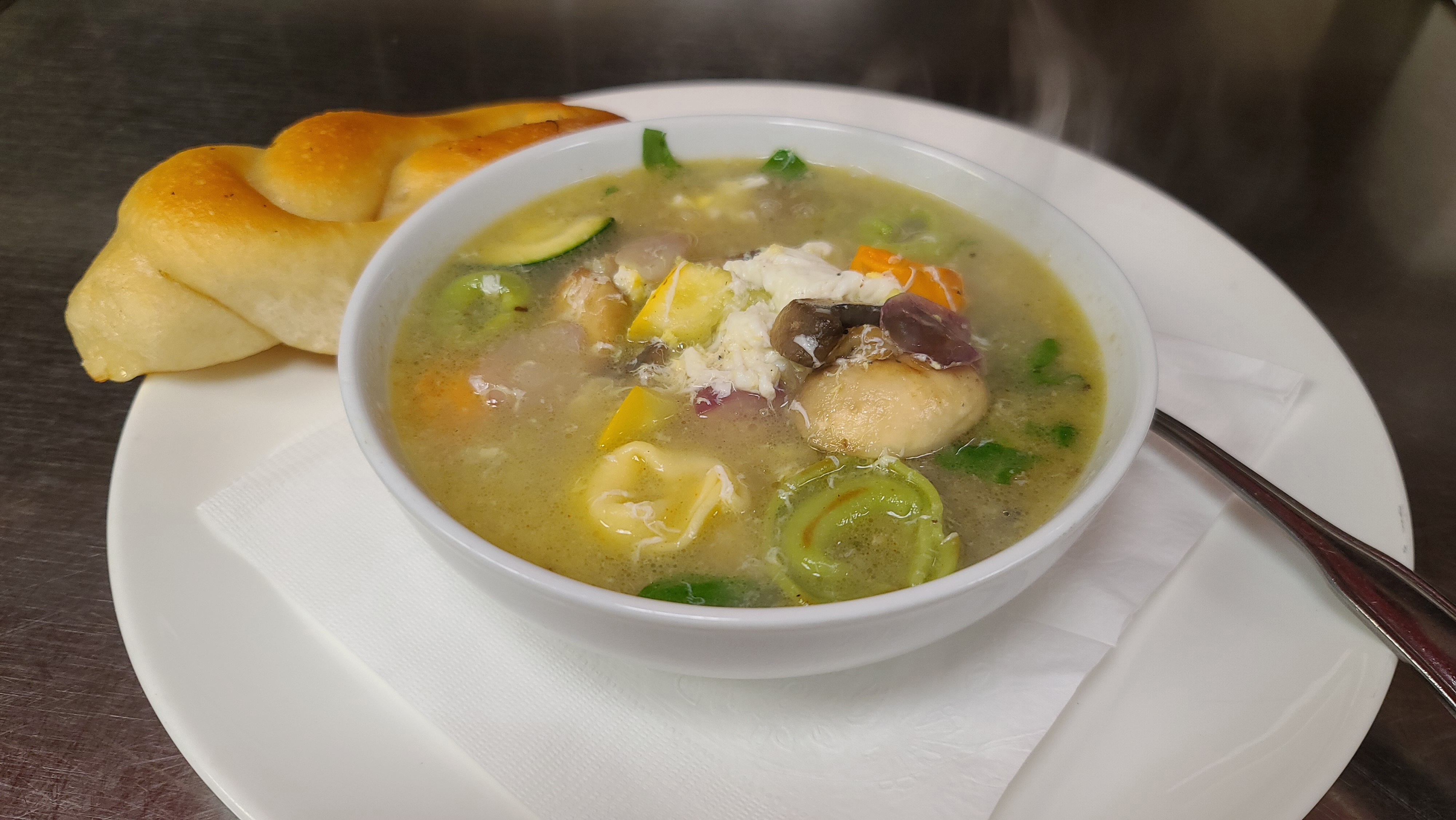 Order Tortellini in Broth Soup food online from Italian Cafe store, Irving on bringmethat.com