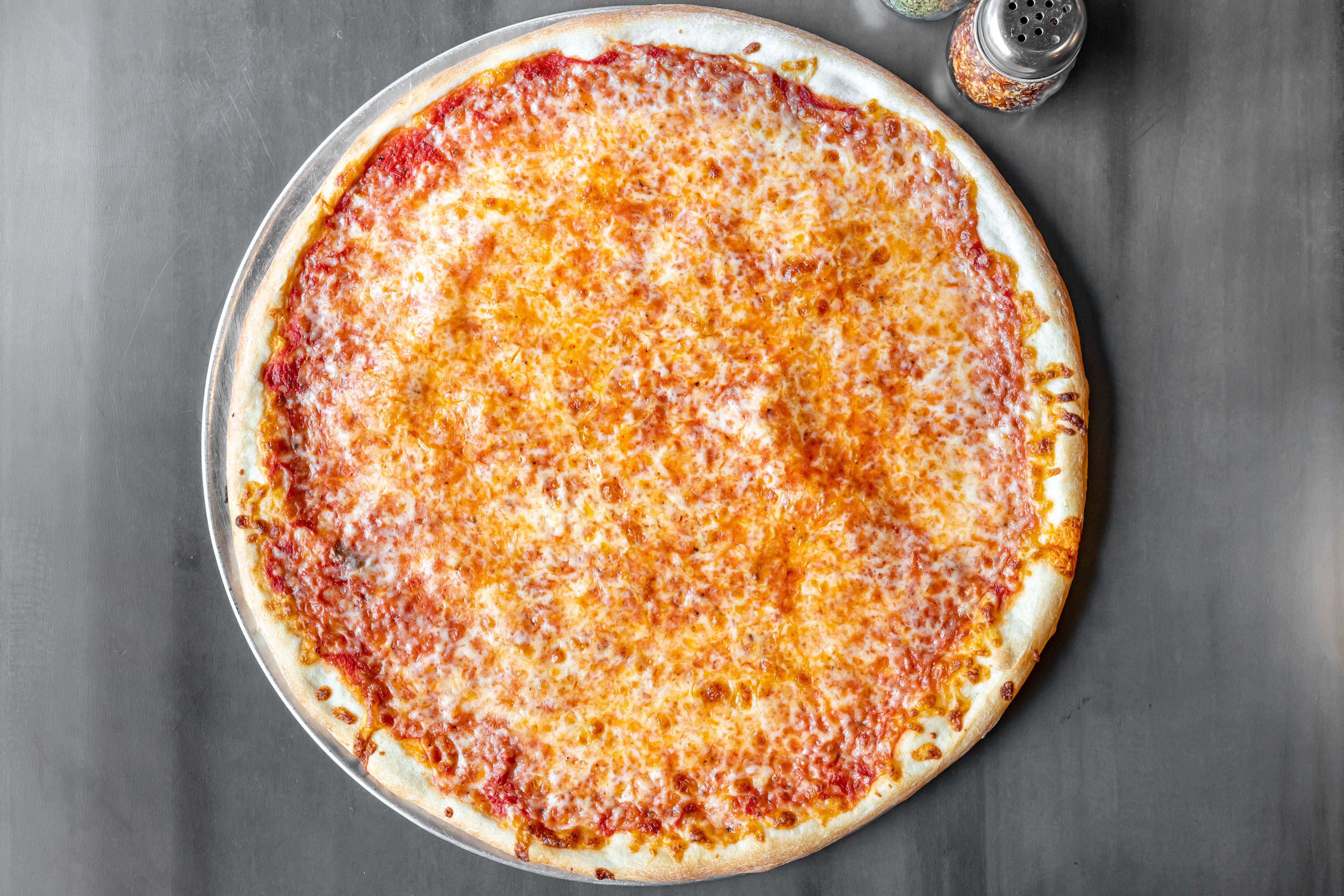 Order Round Cheese Pizza - Large 18'' (8 Slices) food online from Gino Parlor Of Sandy Hook store, Sandy Hook on bringmethat.com