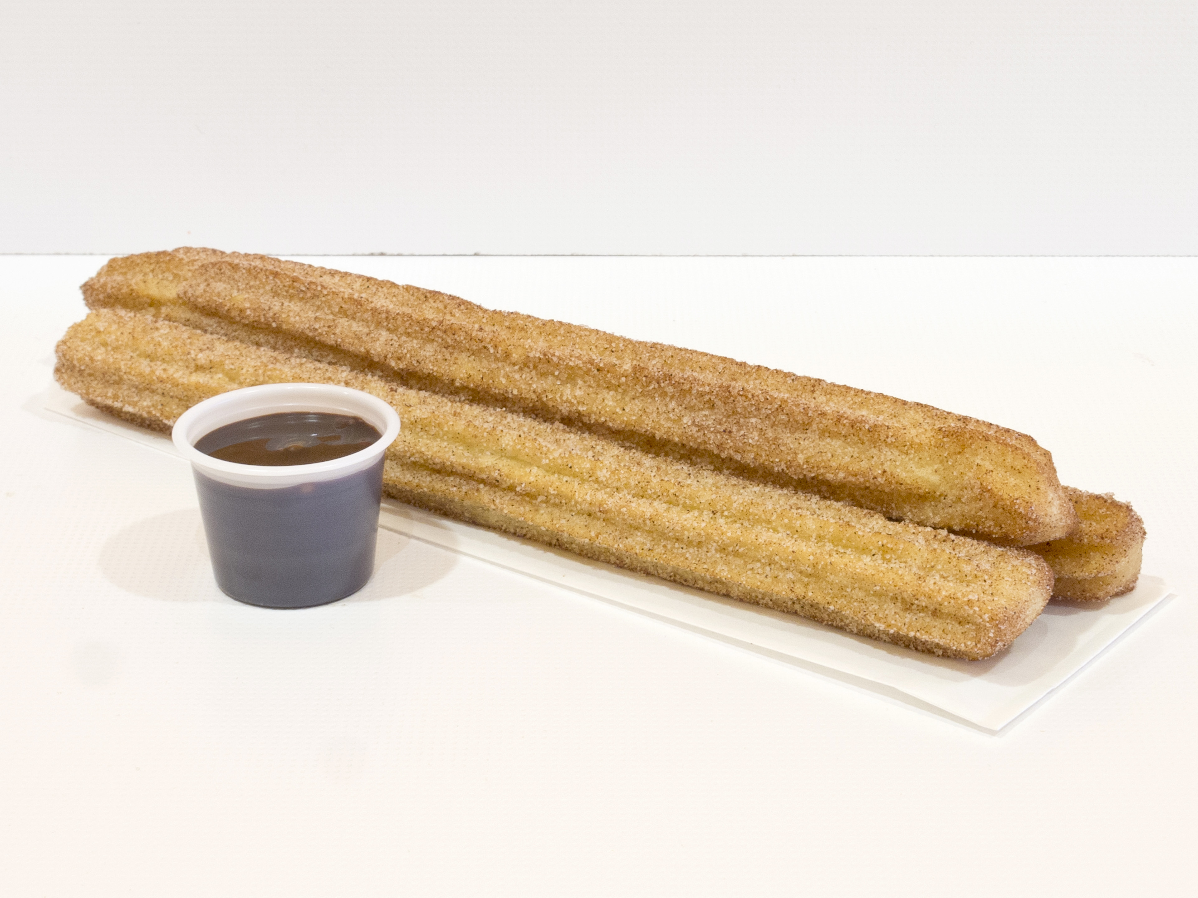 Order Churro with Chocolate Sauce food online from Tappy Yogurt store, Lewisville on bringmethat.com