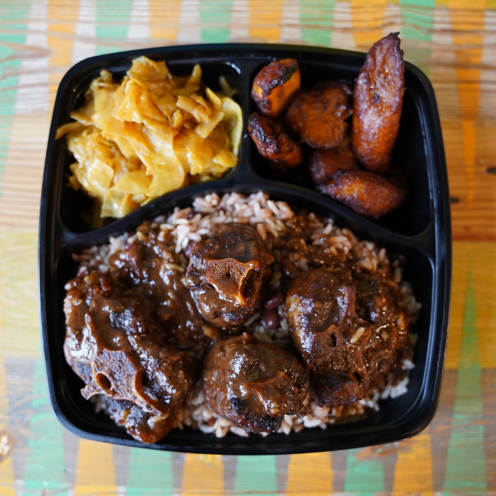 Order OXTAIL BOX food online from Irie Jamaican Kitchen store, Cleveland on bringmethat.com