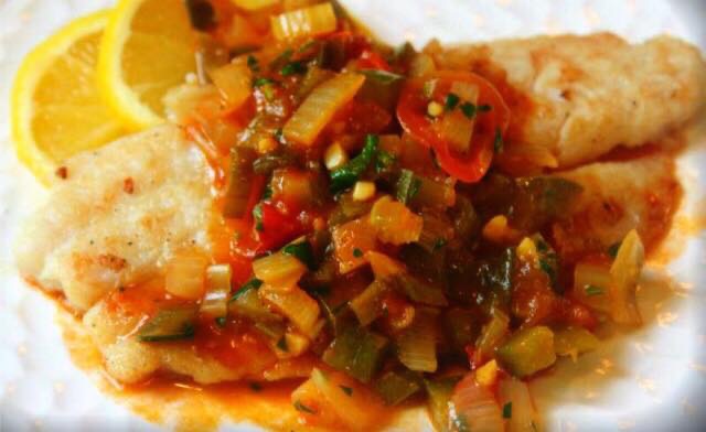 Order Fish with Creole Sauce  food online from Taste Of The Cribbean store, Albuquerque on bringmethat.com