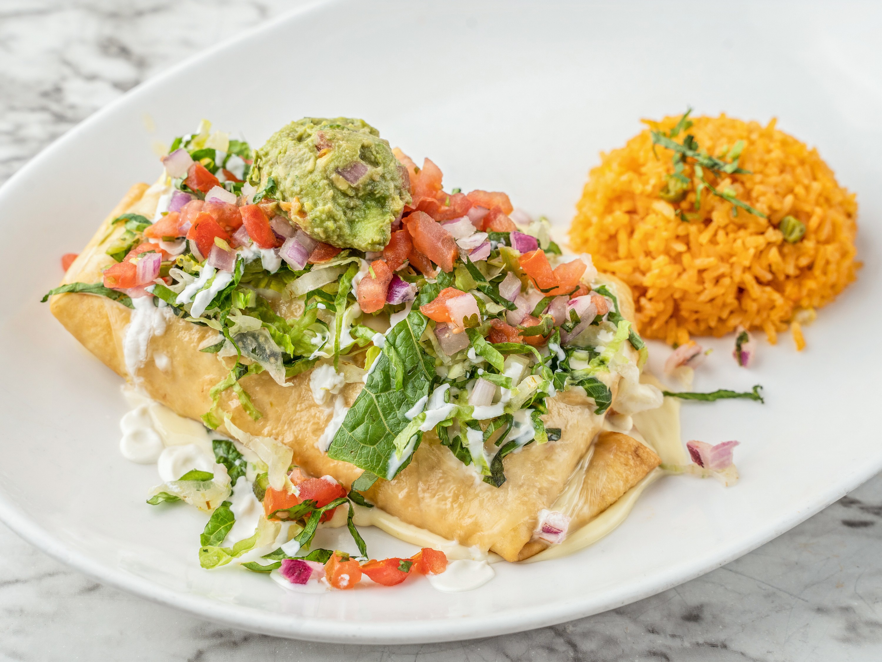 Order Chimichanga food online from Zocalo Street Food | Tequila store, Wilmington on bringmethat.com