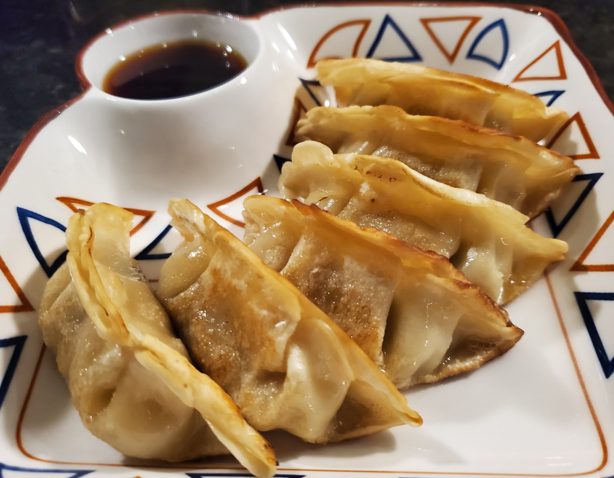 Order Gyoza Pork food online from Iron Fish Sushi & Grill store, Pflugerville on bringmethat.com