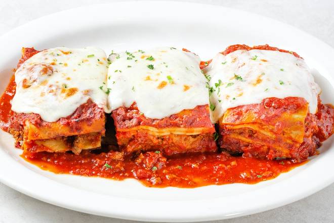 Order JOHNNY'S FRESH BAKED LASAGNA FAMILY PLATTER food online from Johnny Carino's store, Sioux Falls on bringmethat.com