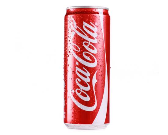 Order Coca-Cola (Can) food online from Fat Cheesesteaks store, New York on bringmethat.com