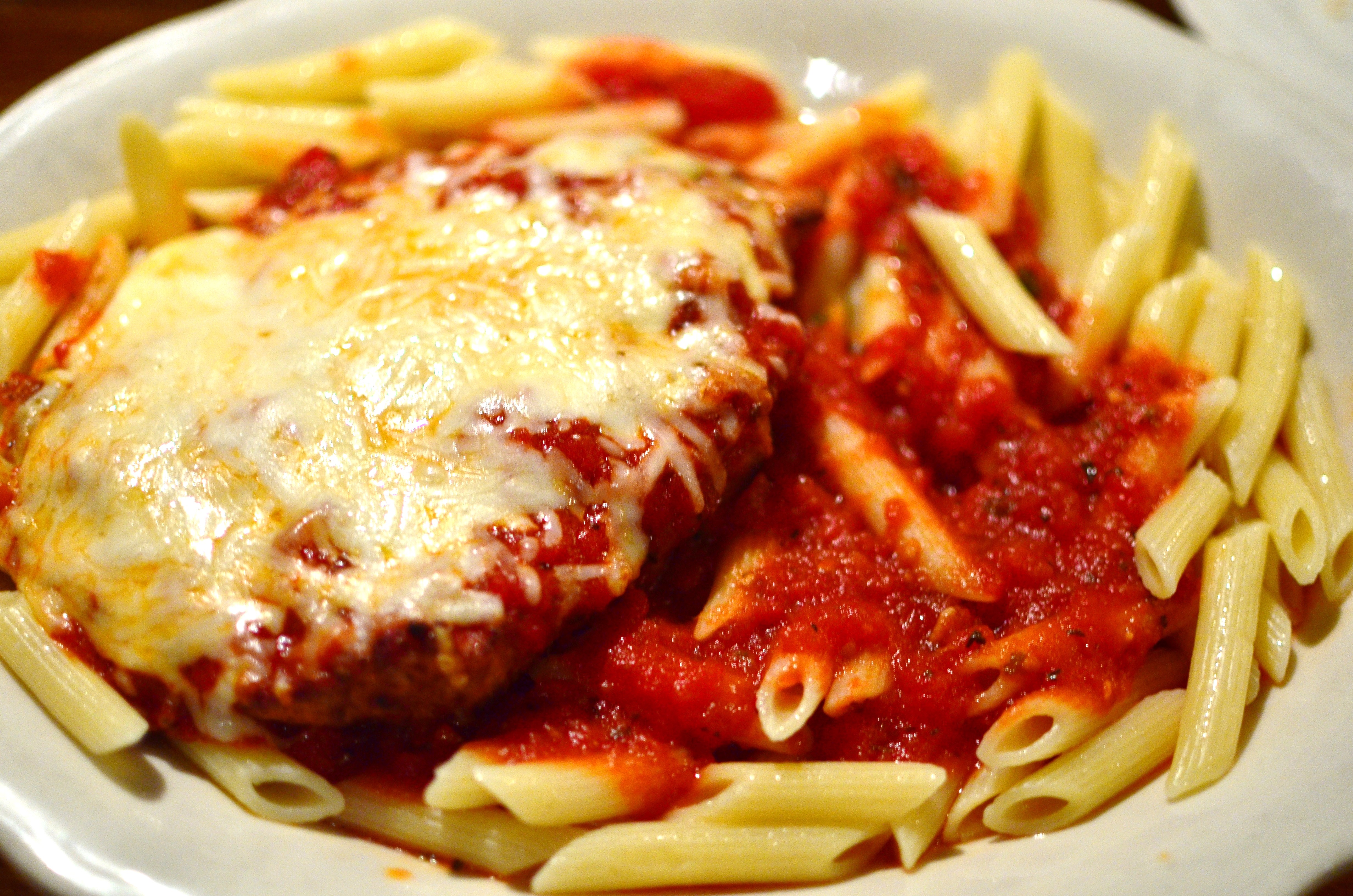 Order 8 Oz. Chicken Cutlet w/ Mozzarella and Provolone Cheese Topped w/ Marinara Sauce  food online from Jonathan Pizza store, Albany on bringmethat.com