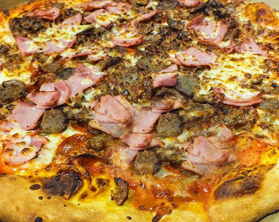 Order Meat Eater Pizza food online from Tony Pizza & Pasta store, Oak Park on bringmethat.com