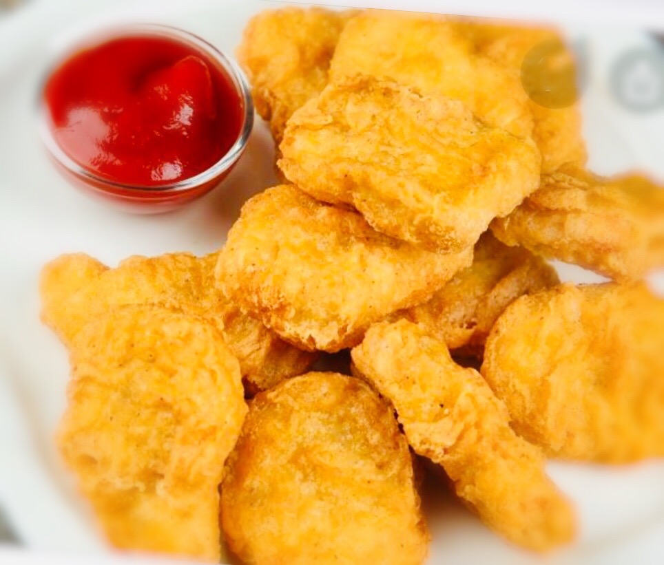 Order Chicken Nuggets (10) food online from Komo asian cuisine store, Bellmore on bringmethat.com