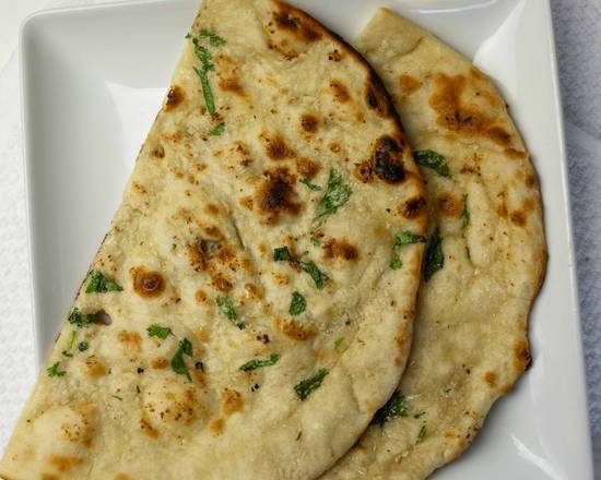 Order Garlic Naan food online from Curry Bowl store, Folsom on bringmethat.com