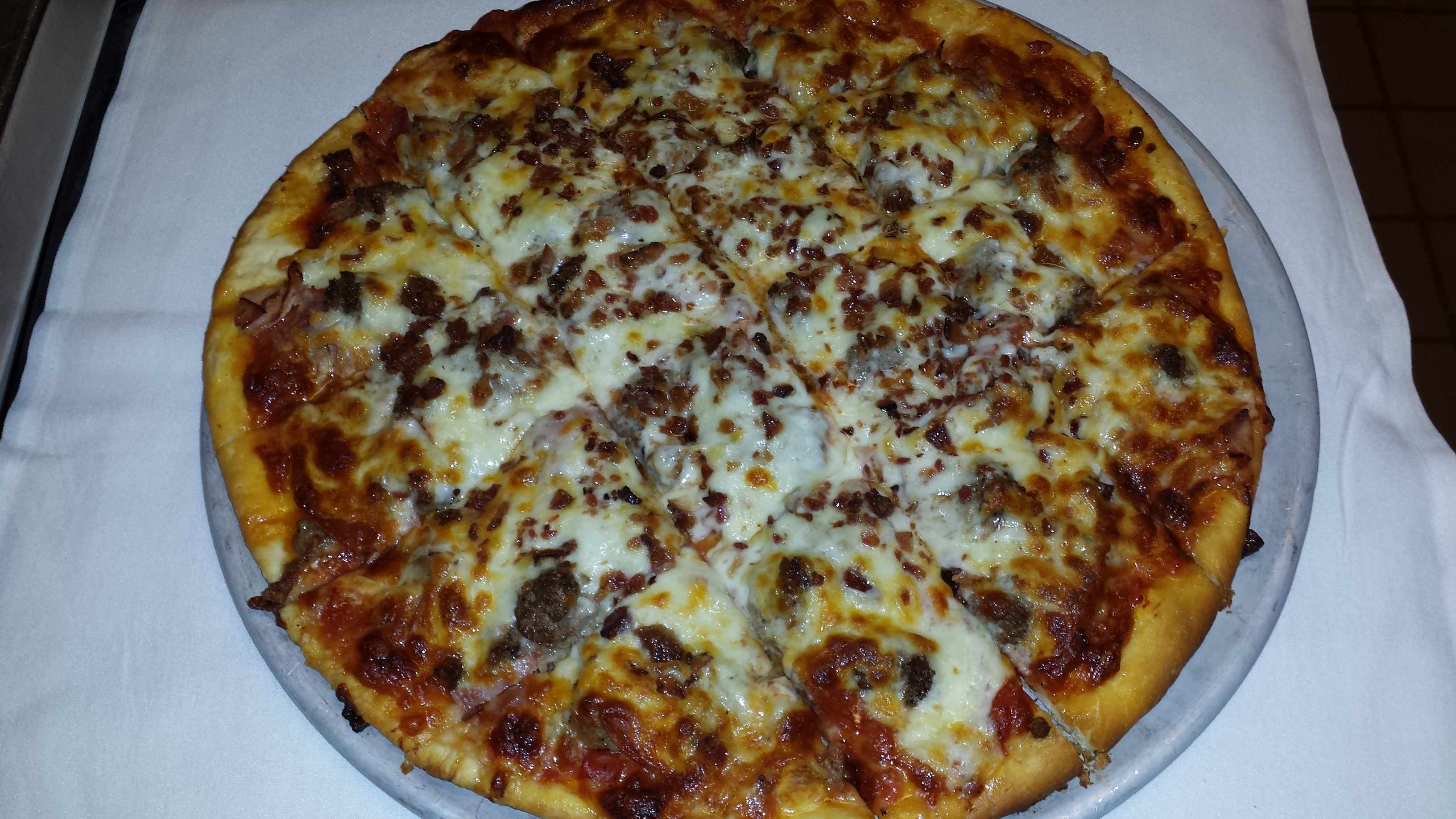 Order Meat Lover's Pizza food online from Sam Ristorante & Pizzeria store, Rockford on bringmethat.com