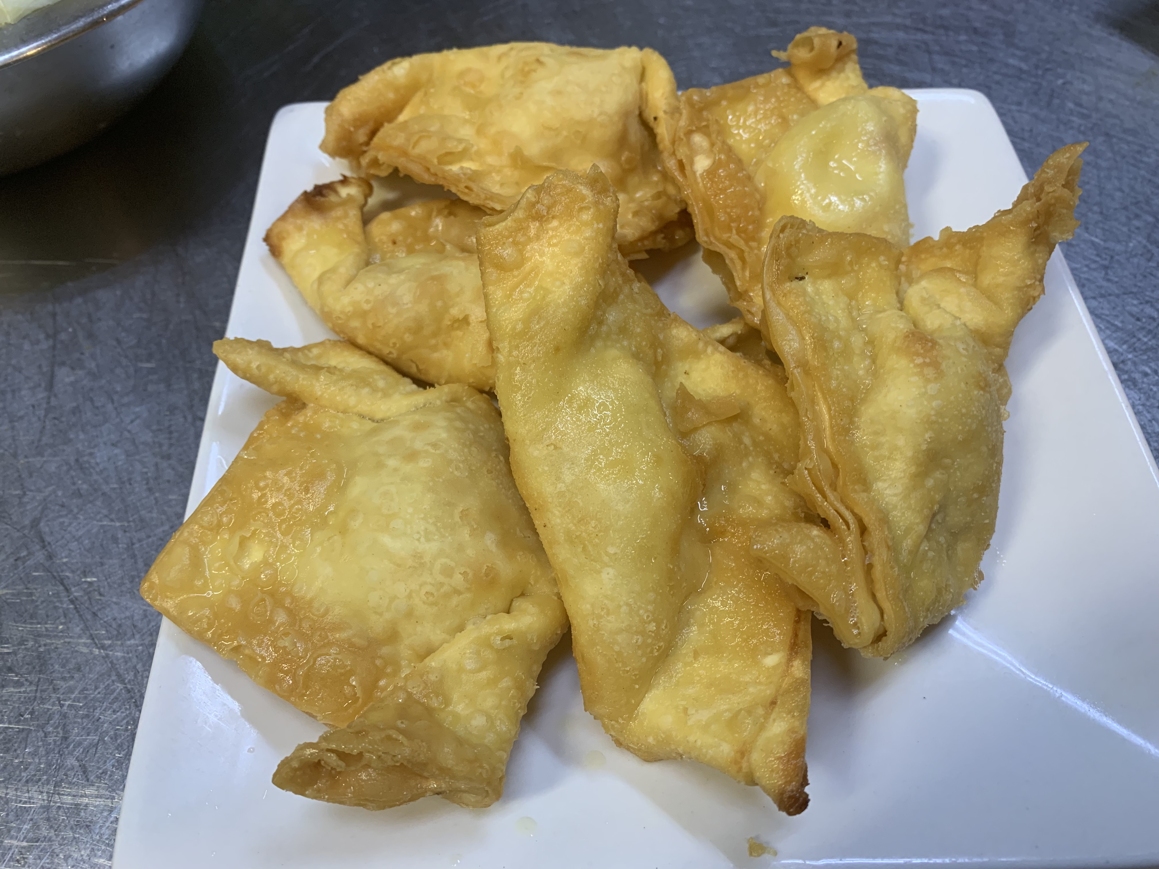 Order 02. Crab Rangoon food online from China Town Cafe store, Chicago on bringmethat.com