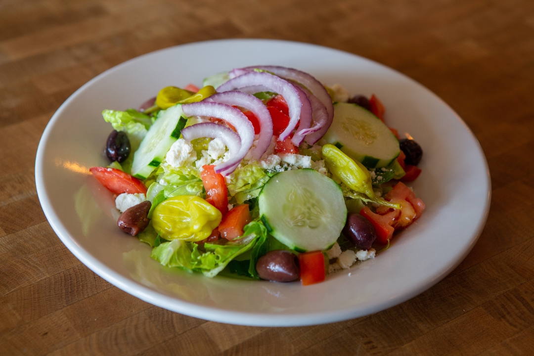 Order Greek Salad food online from Antonio's House of Pizza store, Orlando on bringmethat.com