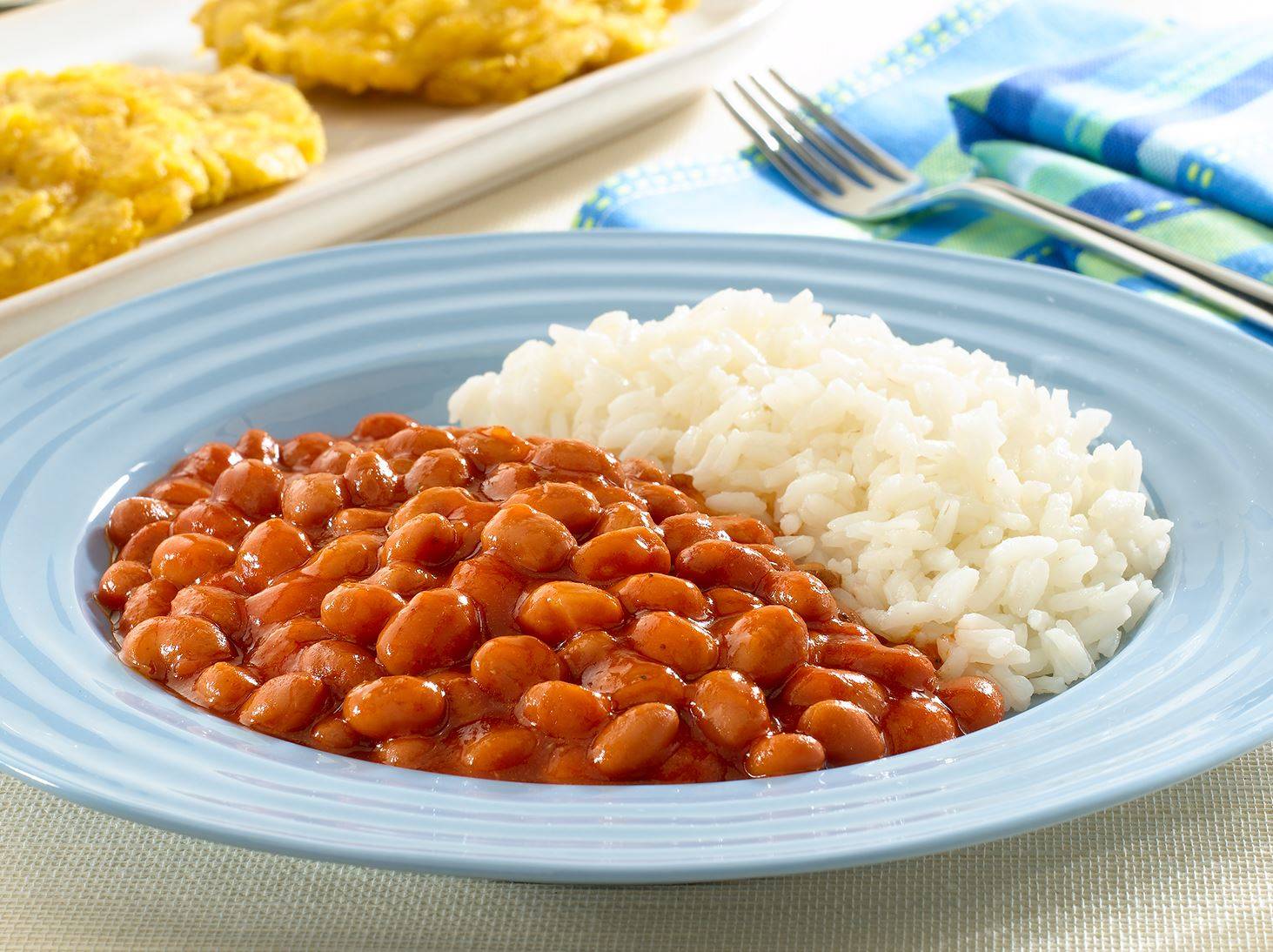 Order Arroz Blanco con Habichuela Guisadas / White Rice with Stewed Beans food online from Flavors Of Heaven store, Saint Cloud on bringmethat.com