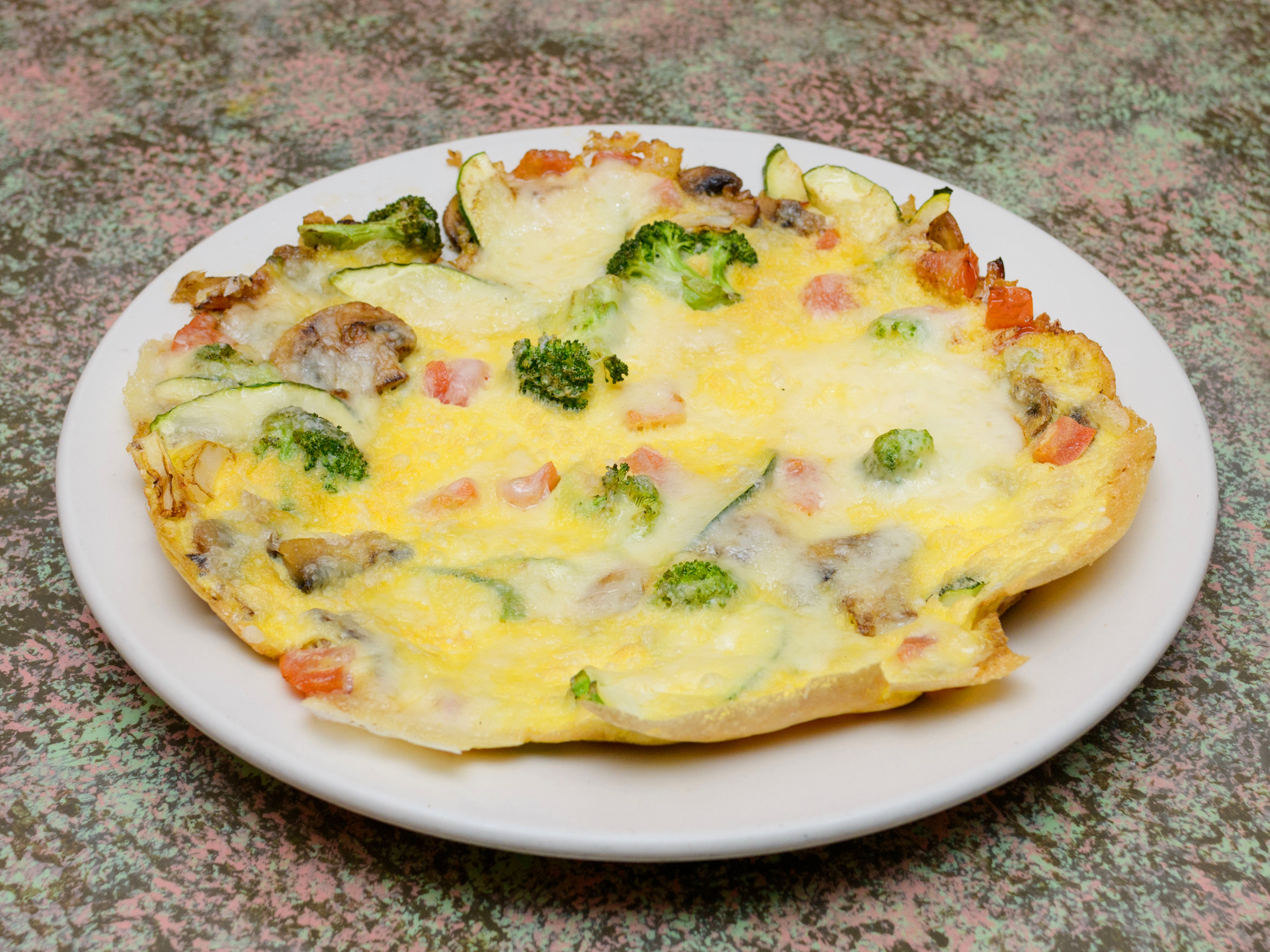 Order Vegetable Frittata food online from Gail Carriage Inn store, Des Plaines on bringmethat.com