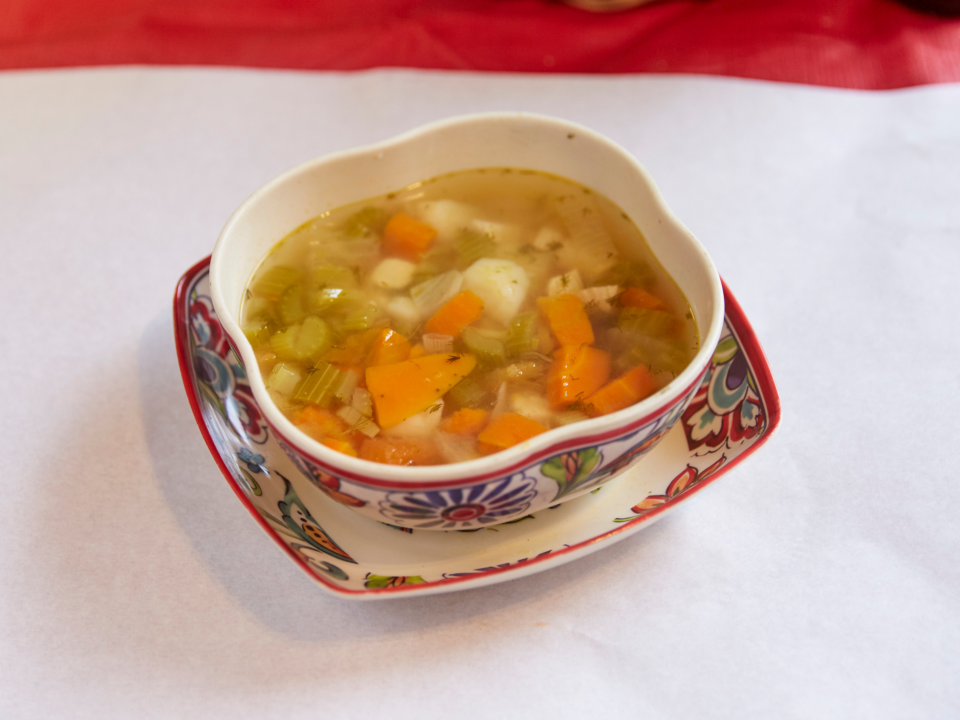Order Chicken and Vegetable Soup food online from Food Passion Cafe store, New York on bringmethat.com